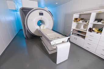 A magnetic resonance imaging scanner with 3 Tesla, as used for the study at the Max Planck Institute for Biological Cybernetics. The picture shows a room with a magnet resonance imaging device.