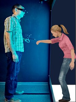 Stephan de la Rosa interacts with an avatar.
